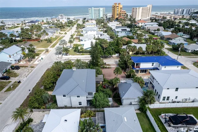 a view of a house with a patio and wooden flooring