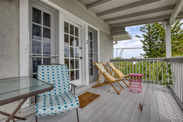 a bathroom with a toilet a sink and a mirror