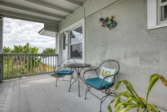 a kitchen with granite countertop wooden cabinets stainless steel appliances and a counter space