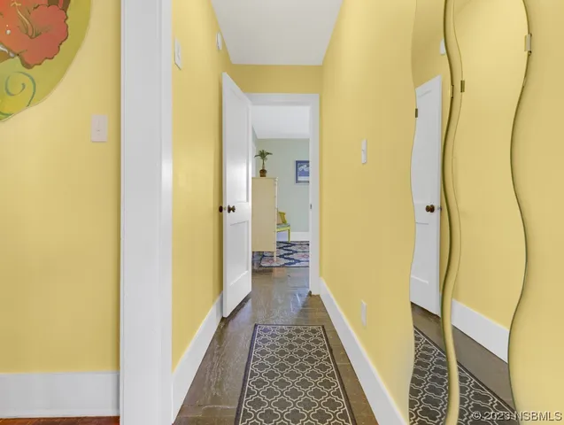 a bed room with a bed and a window