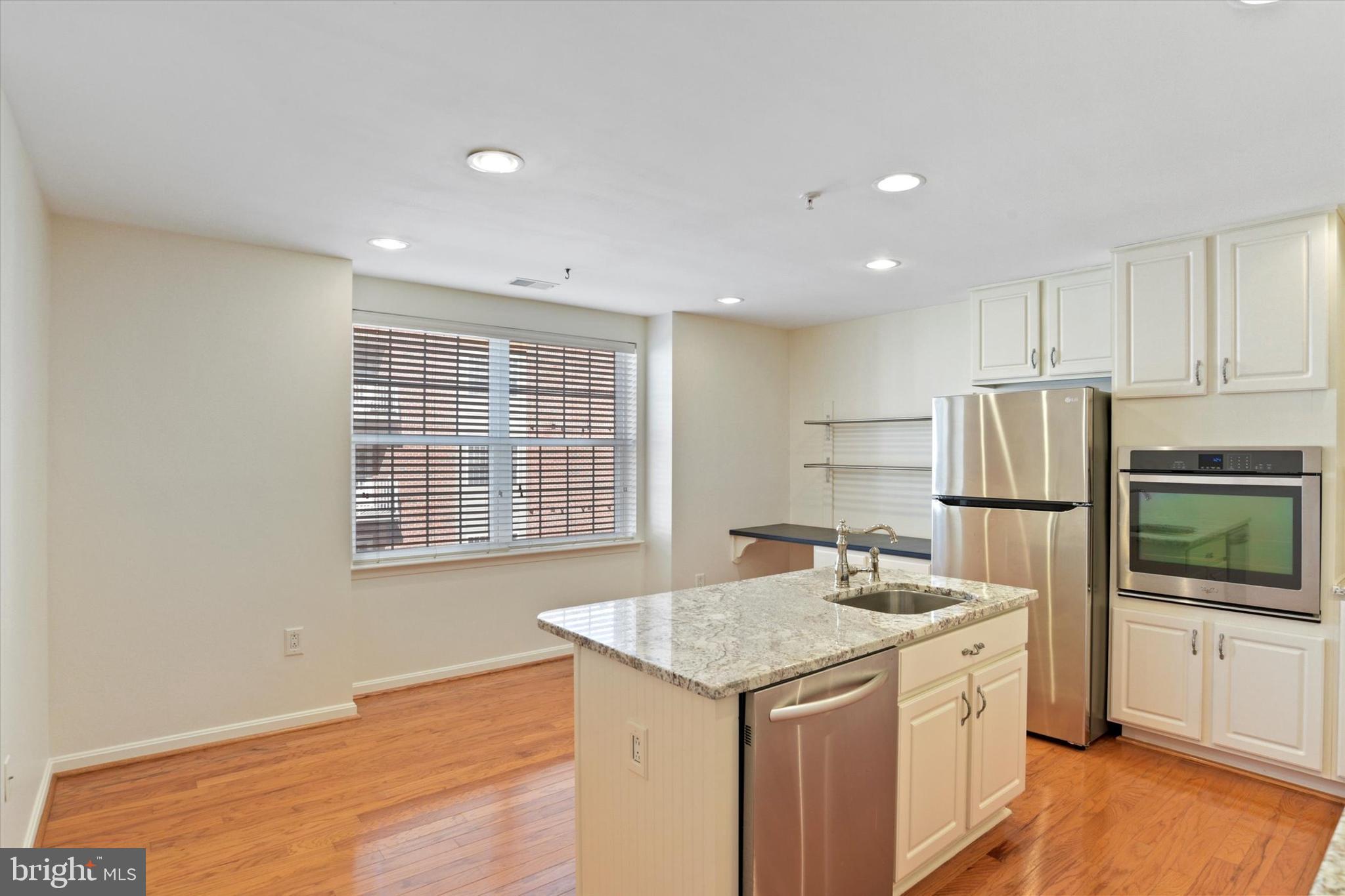 9500 Sidebrook Road, Unit 207 Owings Mills, MD 21117 - Photo 4 of 26 Stainless, granite, recessed lights & eat-in area.