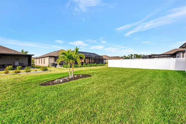 a view of a house with a big yard
