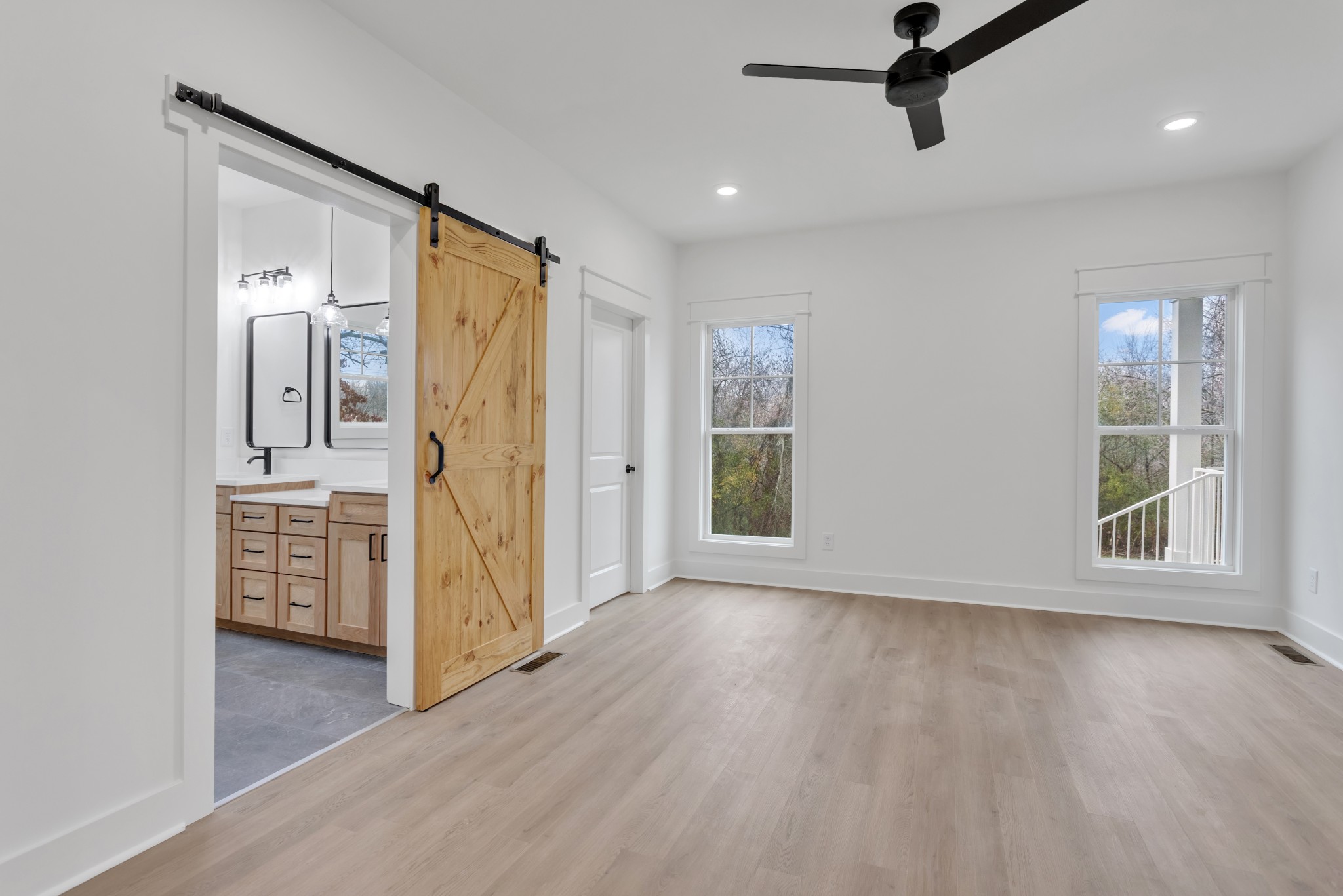 1111 Abiff Road Bon Aqua, TN 37025 - Photo 18 of 34 a view of empty room with wooden floor and window