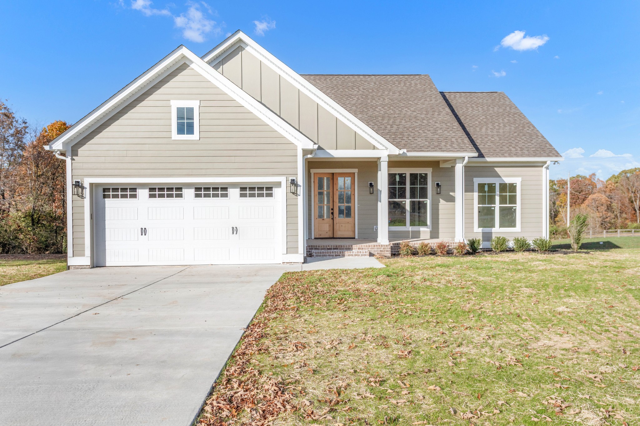 1111 Abiff Road Bon Aqua, TN 37025 - Photo 2 of 34 a view of a house with a yard and sitting area