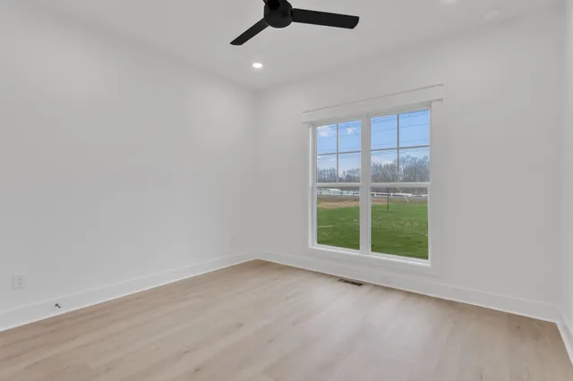 a view of a yard in front of a house