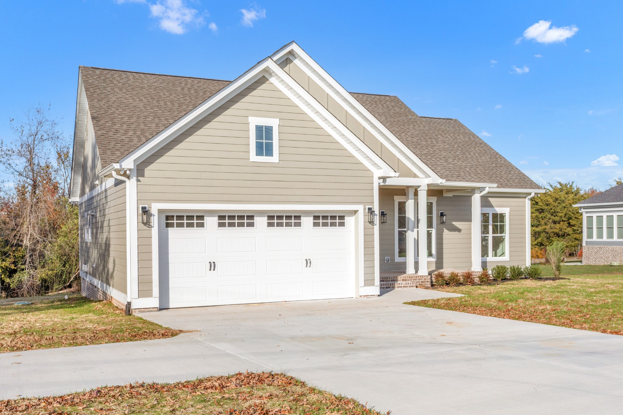 1111 Abiff Road Bon Aqua, TN 37025 - Photo 4 of 34 a view of a white house with a outdoor space