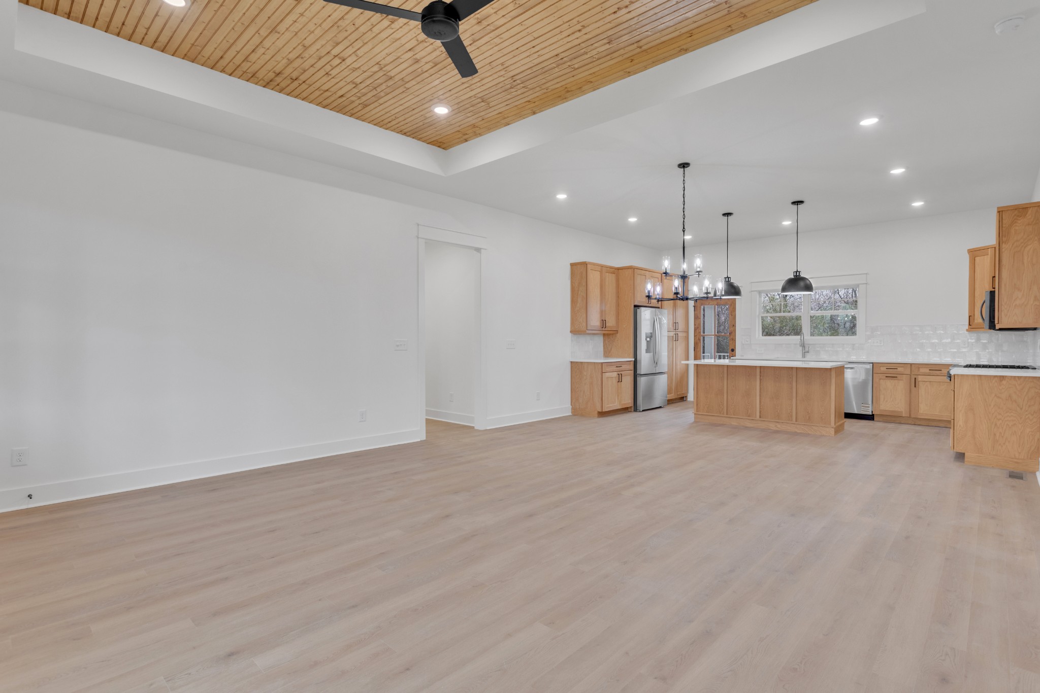 1111 Abiff Road Bon Aqua, TN 37025 - Photo 10 of 35 a view of a kitchen with a refrigerator and a window