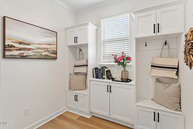 a room with cabinets and wooden floor