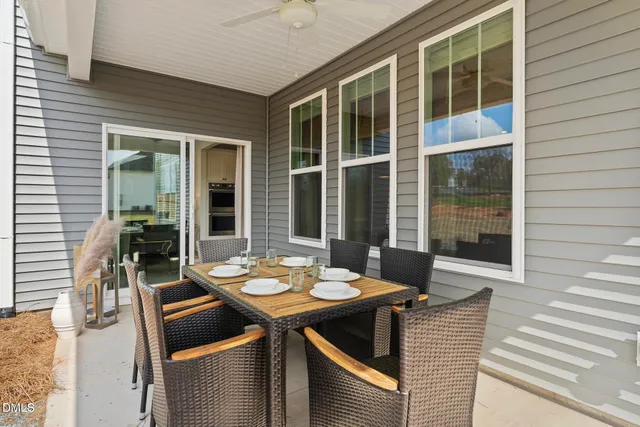 a outdoor dining space with furniture