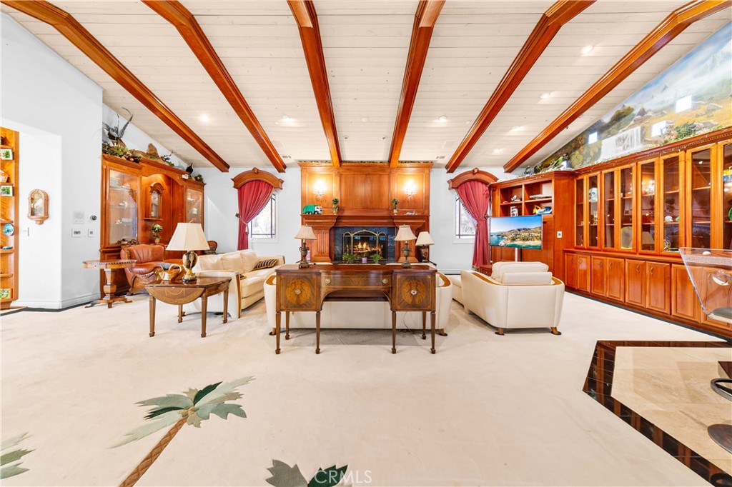 1782 Chota Road La Habra Heights, CA 90631 - Photo 43 of 74 a living room with furniture and a large window