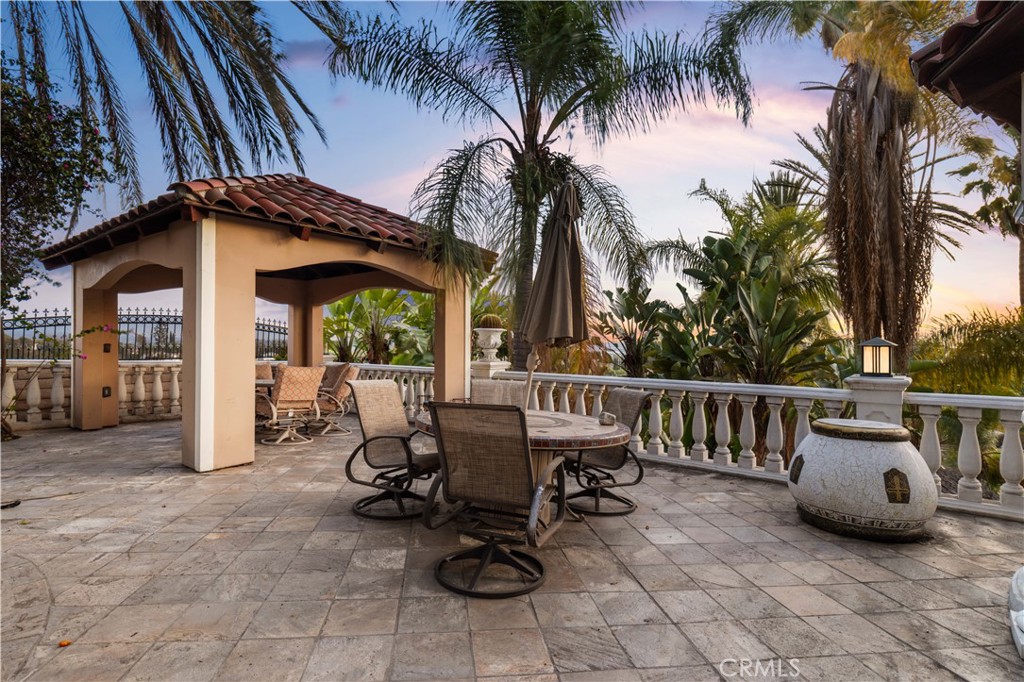 1782 Chota Road La Habra Heights, CA 90631 - Photo 69 of 74 a view of a patio with a table and chairs