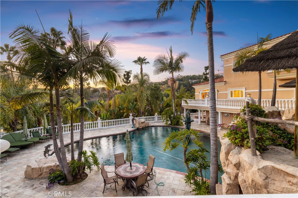 1782 Chota Road La Habra Heights, CA 90631 - Photo 70 of 74 a view of a swimming pool with a patio and a garden