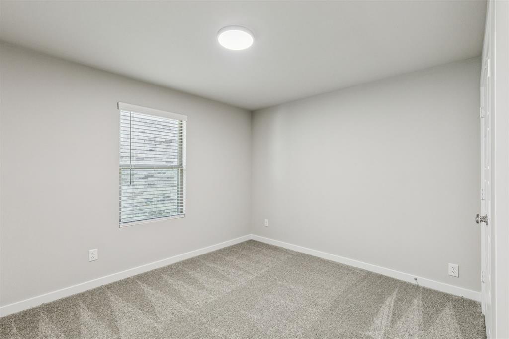 849 Rockcloud Drive Haslet, TX 76052 - Photo 21 of 27 Bedroom in the Harper home plan by Trophy Signature Homes – REPRESENTATIVE PHOTO
