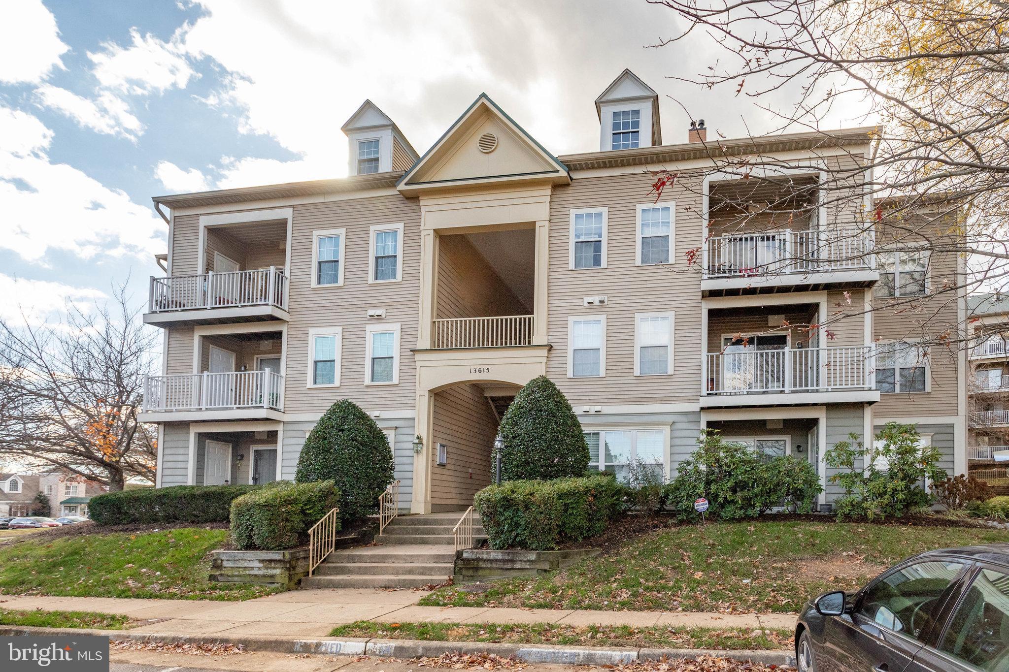 13615 Garfield Place, Unit 203 Woodbridge, VA 22191 - Photo 23 of 25 a front view of a residential houses