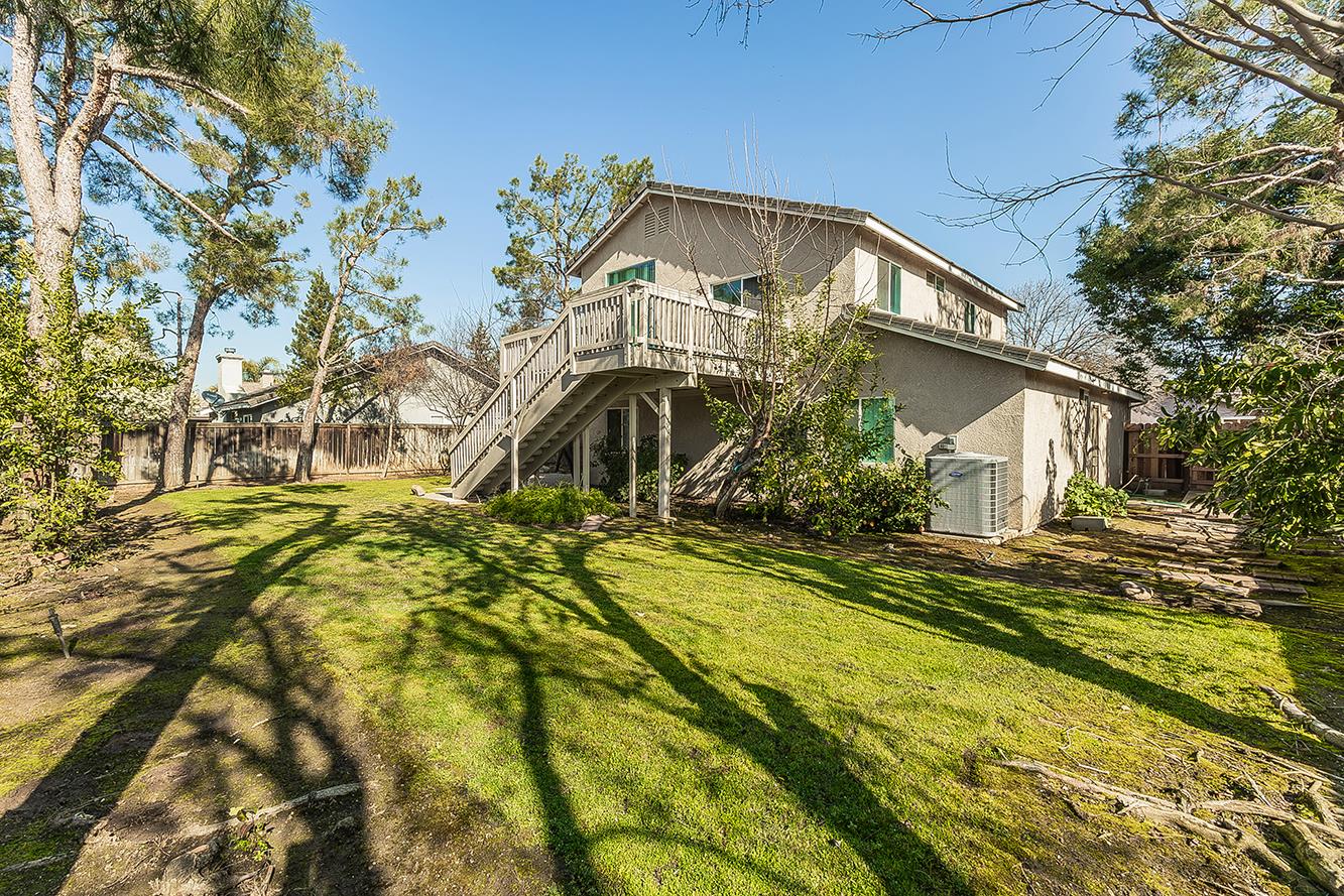 1322 Carson Avenue Clovis, CA 93611 - Photo 15 of 37 a view of a house with a large trees