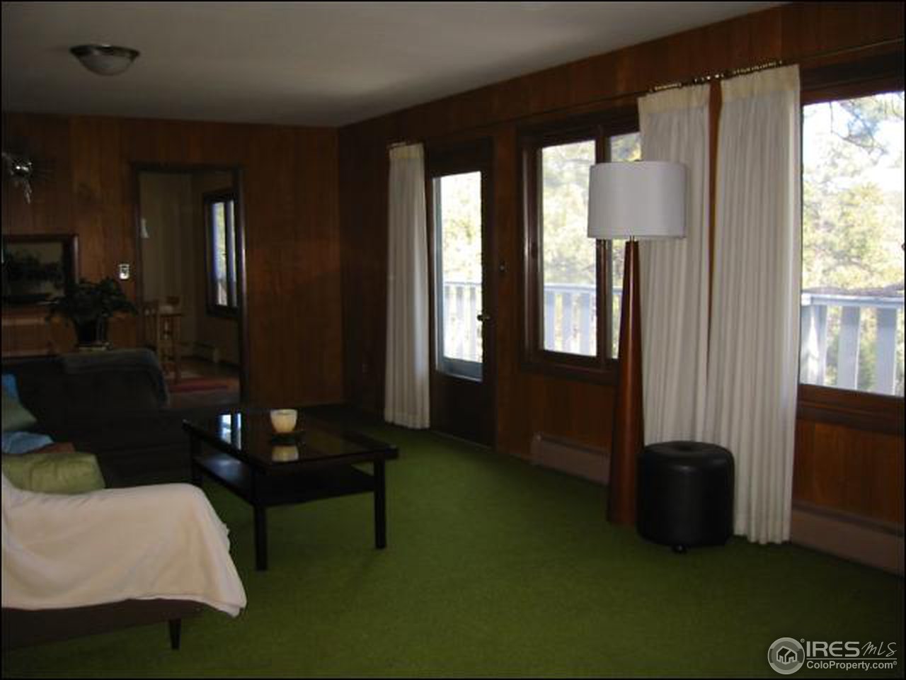 524 Kelly Road West Boulder, CO 80302 - Photo 4 of 18 a living room with furniture rug and window
