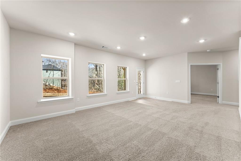 657 Forest Way Cornelia, GA 30531 - Photo 27 of 54 a view of an empty room with a window