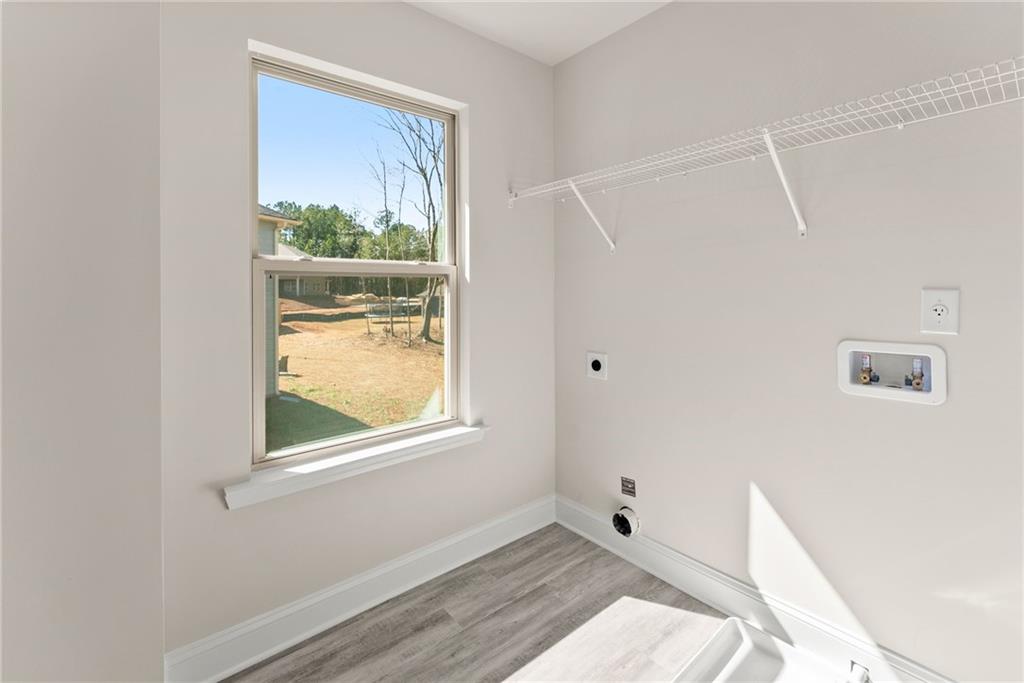 657 Forest Way Cornelia, GA 30531 - Photo 29 of 54 a view of an empty room with a window