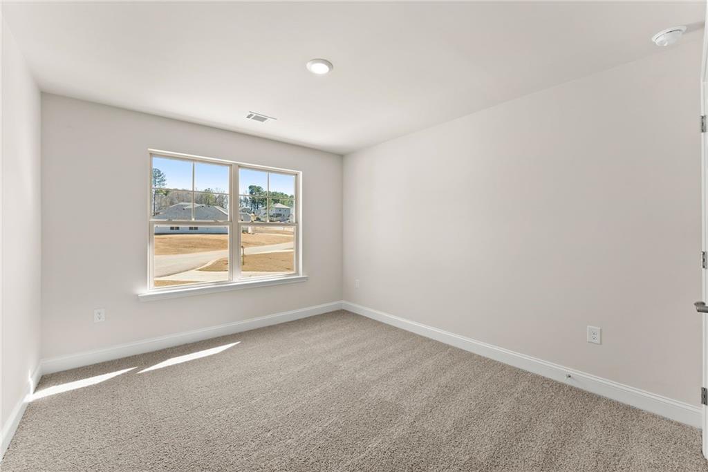 657 Forest Way Cornelia, GA 30531 - Photo 30 of 54 an empty room with a window