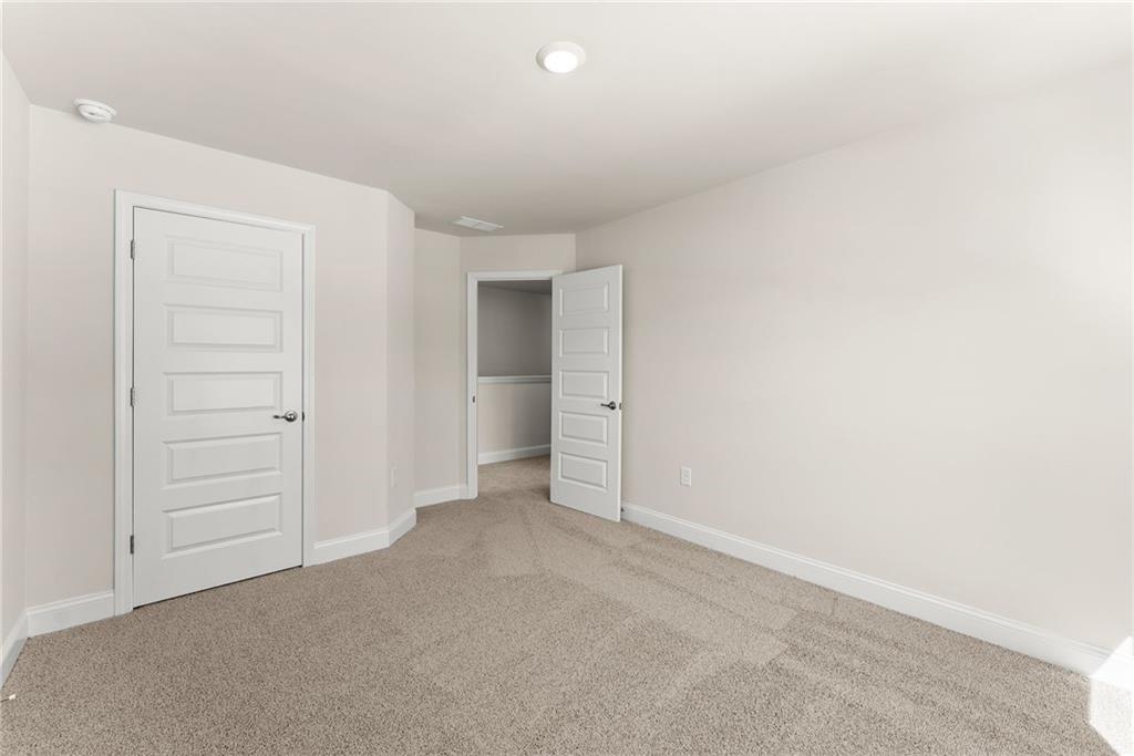 657 Forest Way Cornelia, GA 30531 - Photo 31 of 54 an empty room with closet area