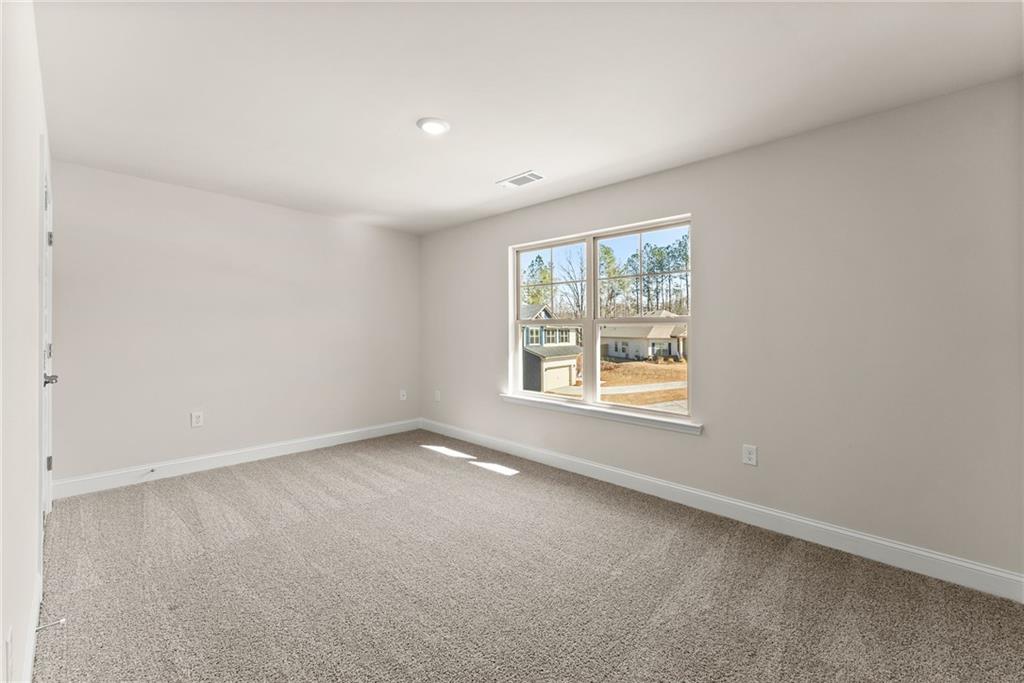 657 Forest Way Cornelia, GA 30531 - Photo 34 of 54 an empty room with a window