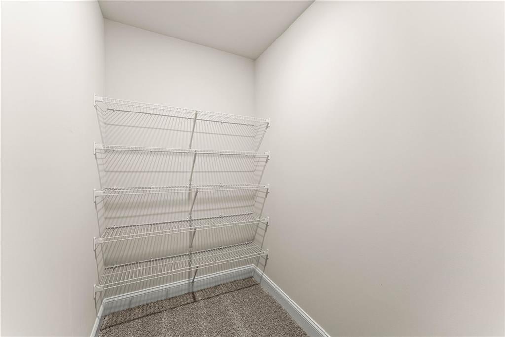 657 Forest Way Cornelia, GA 30531 - Photo 36 of 54 a view of a room with racks on the wall
