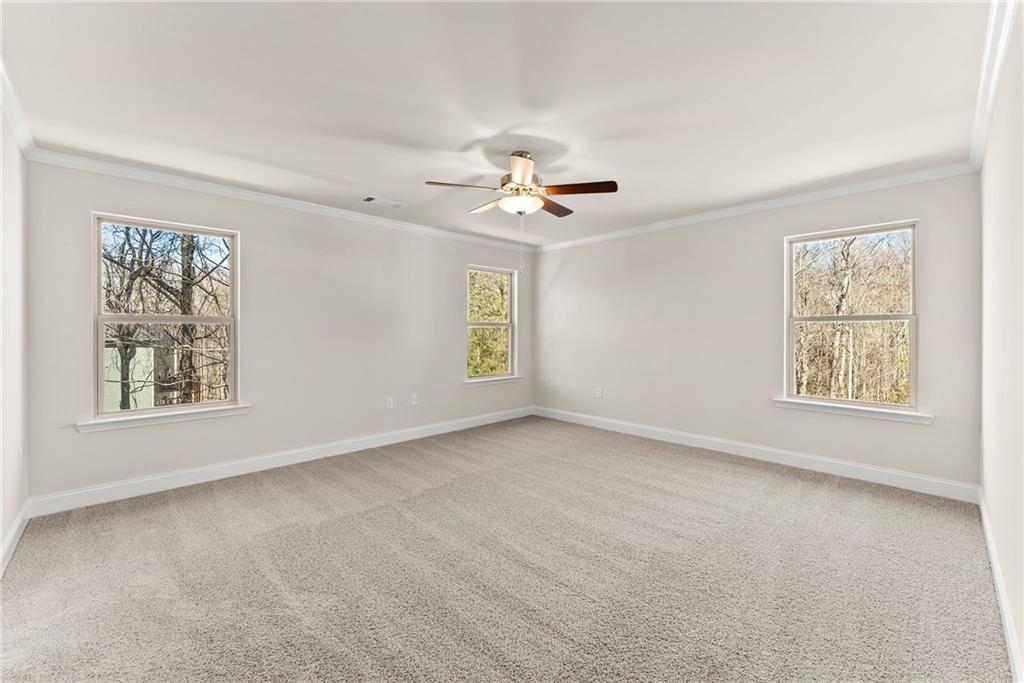 657 Forest Way Cornelia, GA 30531 - Photo 37 of 54 a view of an empty room with a window