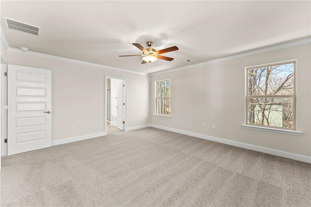 657 Forest Way Cornelia, GA 30531 - Photo 38 of 54 a view of an empty room with a window
