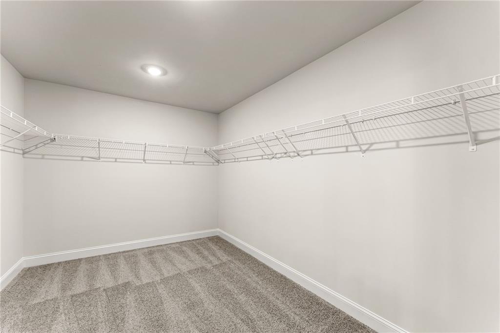 657 Forest Way Cornelia, GA 30531 - Photo 40 of 54 a view of a room with racks on the wall