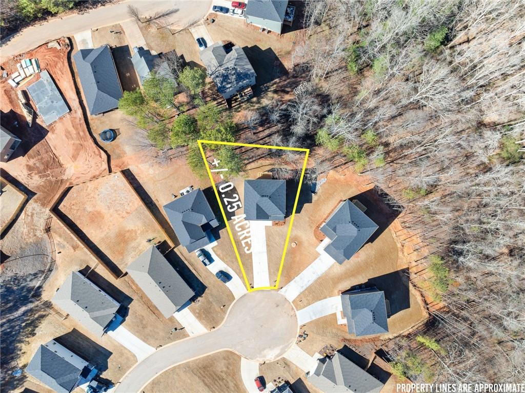 657 Forest Way Cornelia, GA 30531 - Photo 52 of 54 an aerial view of a house with swimming pool
