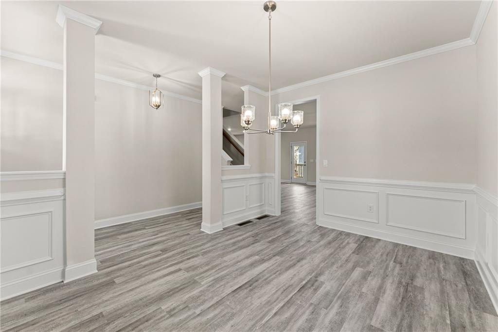 657 Forest Way Cornelia, GA 30531 - Photo 10 of 54 a view of a room with wooden floor and window