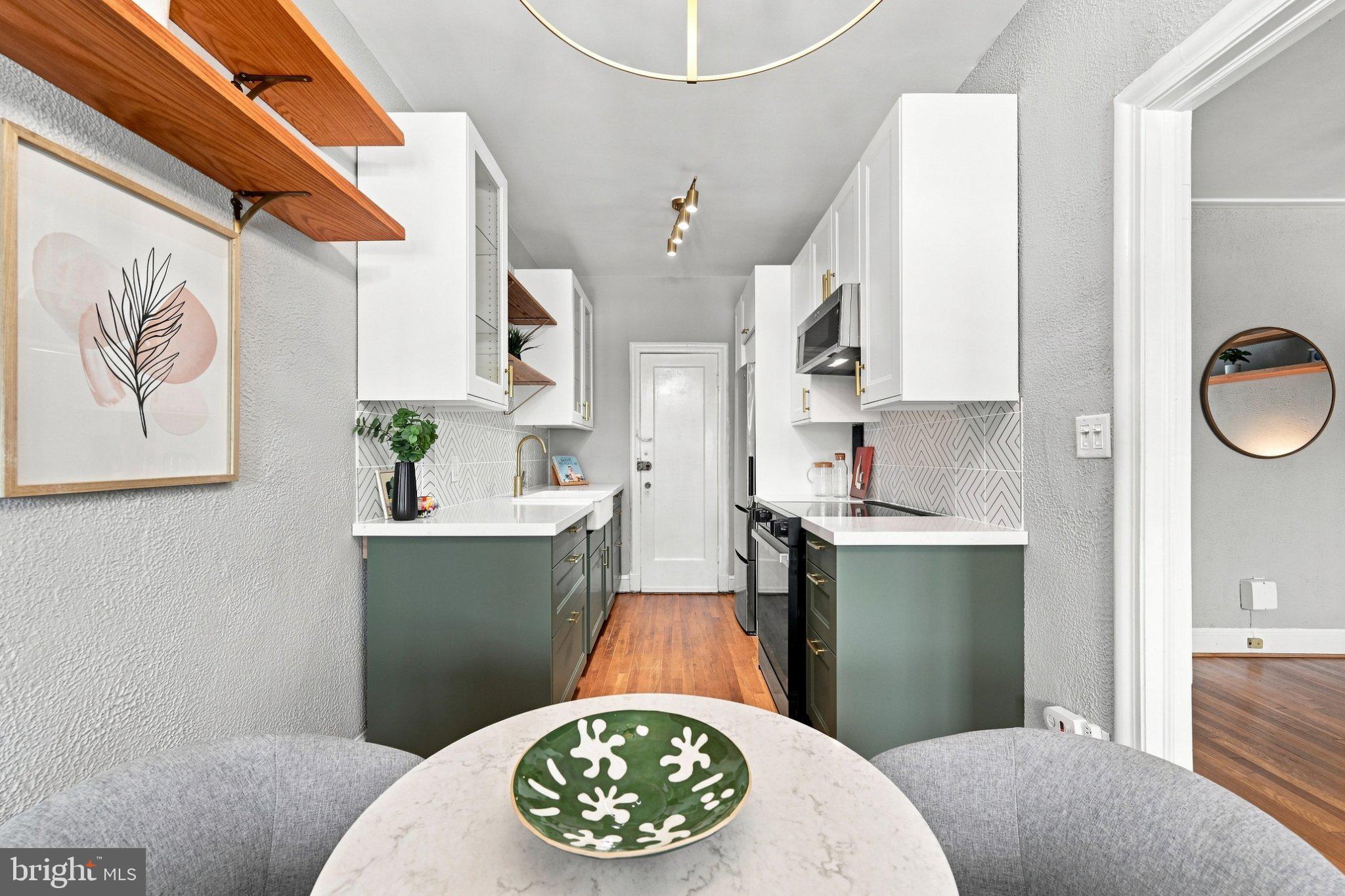 2032 Belmont Road Northwest, Unit 632 Washington, DC 20009 - Photo 11 of 31 Charming kitchen with modern flair.