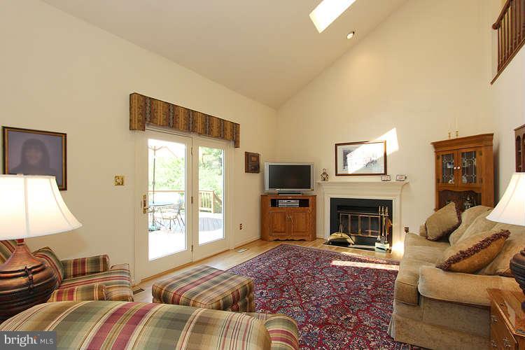20604 Bell Bluff Road Gaithersburg, MD 20882 - Photo 14 of 30 Living room with WOOD Burning fireplace.