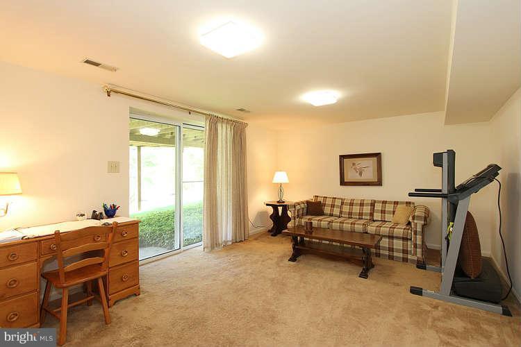 20604 Bell Bluff Road Gaithersburg, MD 20882 - Photo 25 of 30 Enjoy the Basement entertainment room.