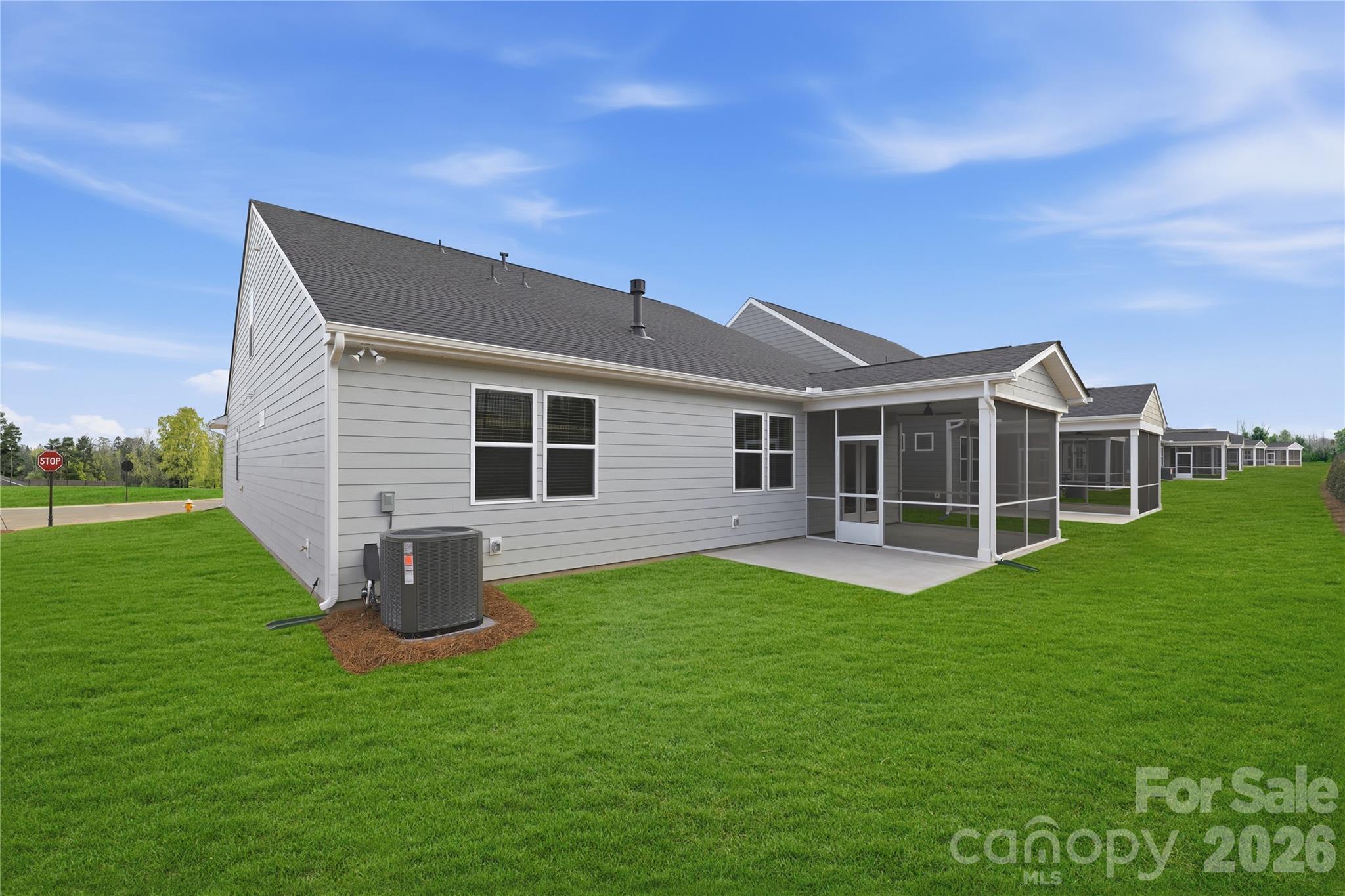 1028 Garfield Road Sherrills Ford, NC 28673 - Photo 2 of 37 a front view of a house with a garden