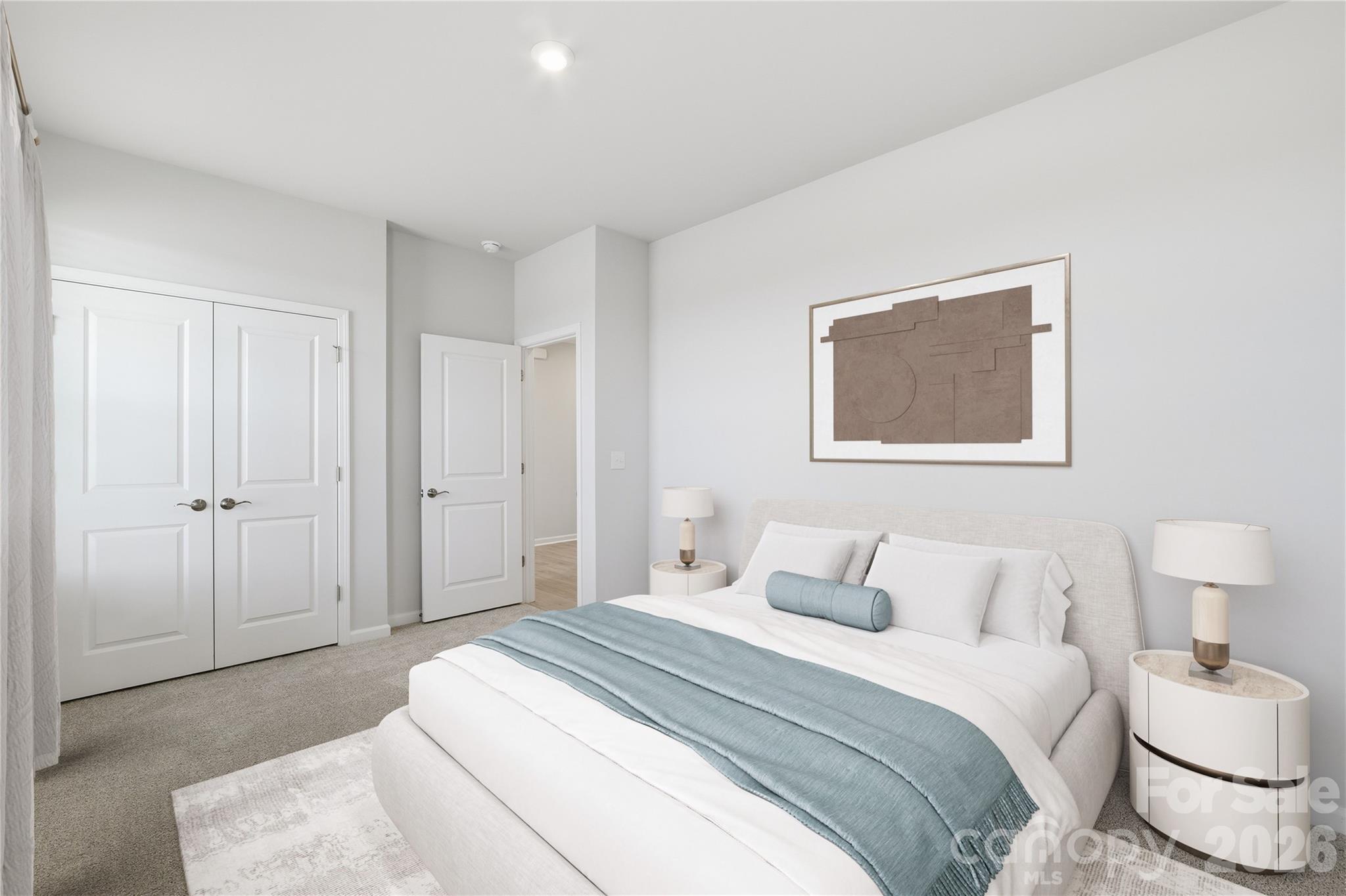 1028 Garfield Road Sherrills Ford, NC 28673 - Photo 22 of 37 a bedroom with a bed and a painting on the wall