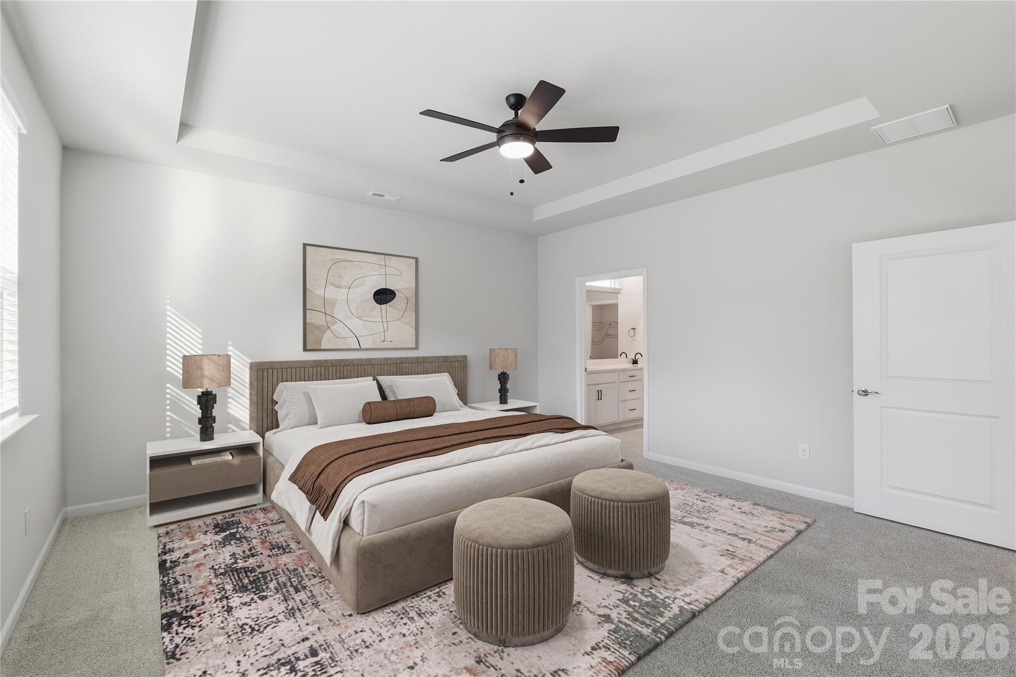 1028 Garfield Road Sherrills Ford, NC 28673 - Photo 6 of 37 a bedroom with a bed and ceiling fan