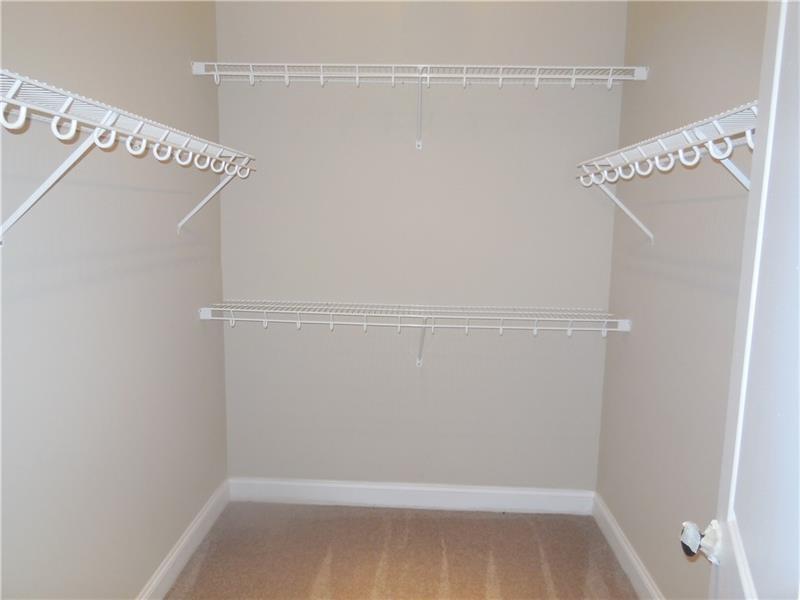 27 Pinehurst Place, Unit 27 Beaver, PA 15009 - Photo 9 of 19 a view of a room with racks on the wall