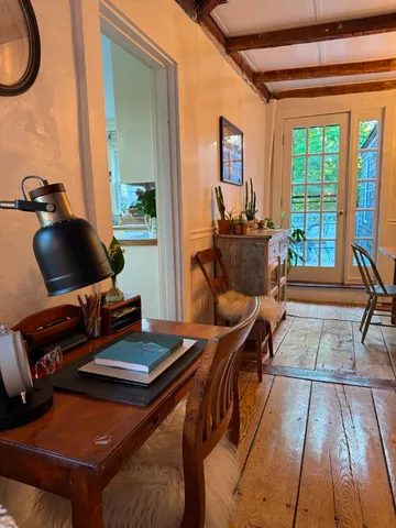 a view of a living room and a window