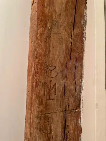 a front view of a house with a garden and porch