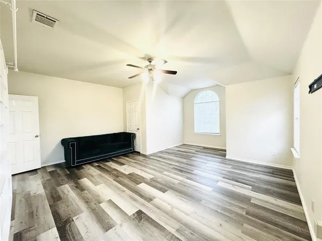 a bathroom with a sink a mirror and a toilet