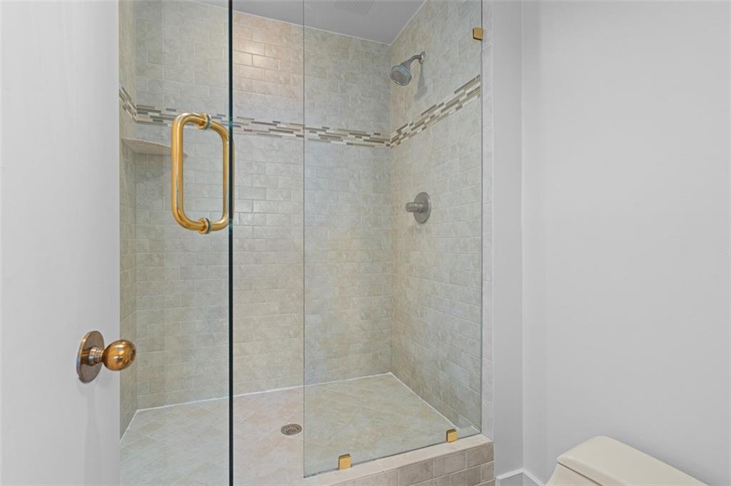 2660 Peachtree Road Northwest, Unit 19A Atlanta, GA 30305 - Photo 15 of 51 a bathroom with a shower