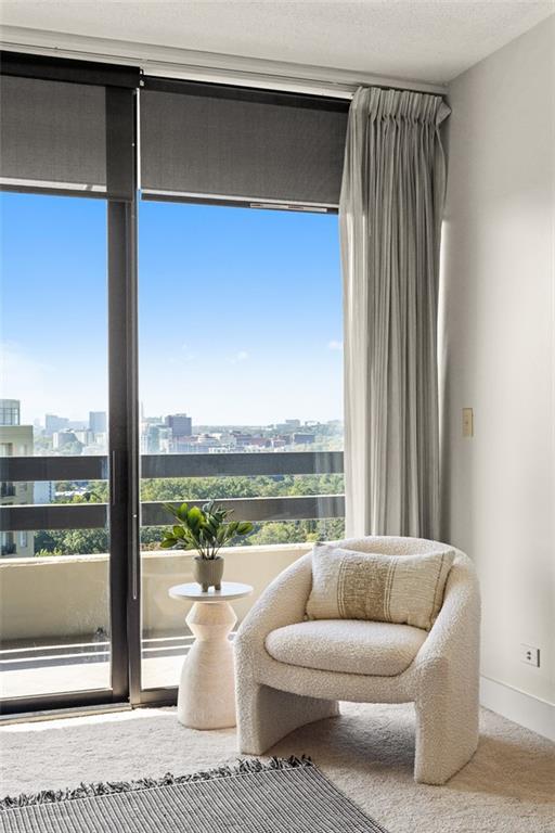 2660 Peachtree Road Northwest, Unit 19A Atlanta, GA 30305 - Photo 19 of 51 a view of roof deck with couches and city view