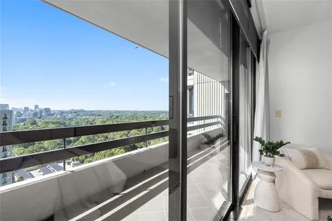 a view of a balcony with lake view and mountain view