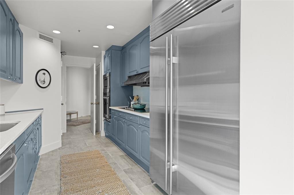 2660 Peachtree Road Northwest, Unit 19A Atlanta, GA 30305 - Photo 26 of 51 a bathroom with a bathtub and a shower