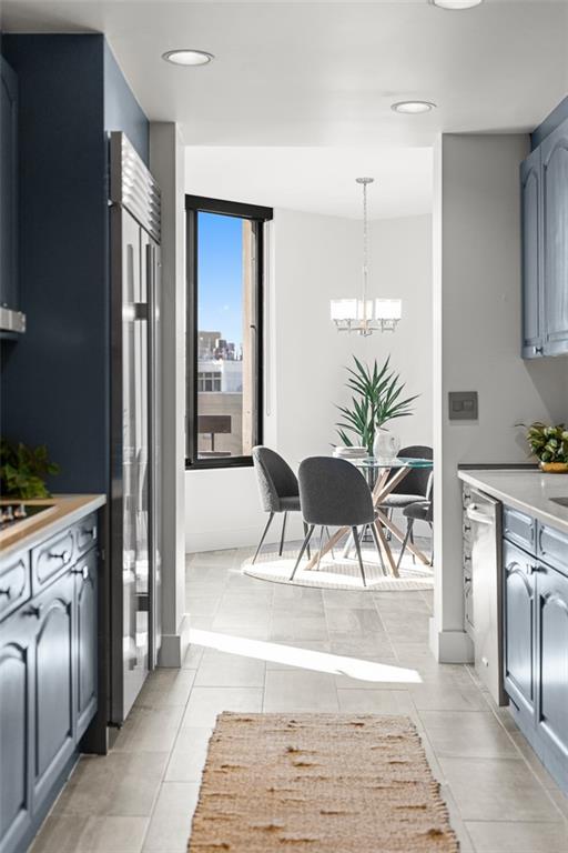 2660 Peachtree Road Northwest, Unit 19A Atlanta, GA 30305 - Photo 30 of 51 a living room with furniture and a fireplace