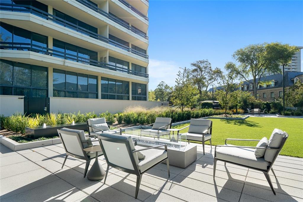 2660 Peachtree Road Northwest, Unit 19A Atlanta, GA 30305 - Photo 38 of 51 a view of swimming pool with outdoor seating and plants