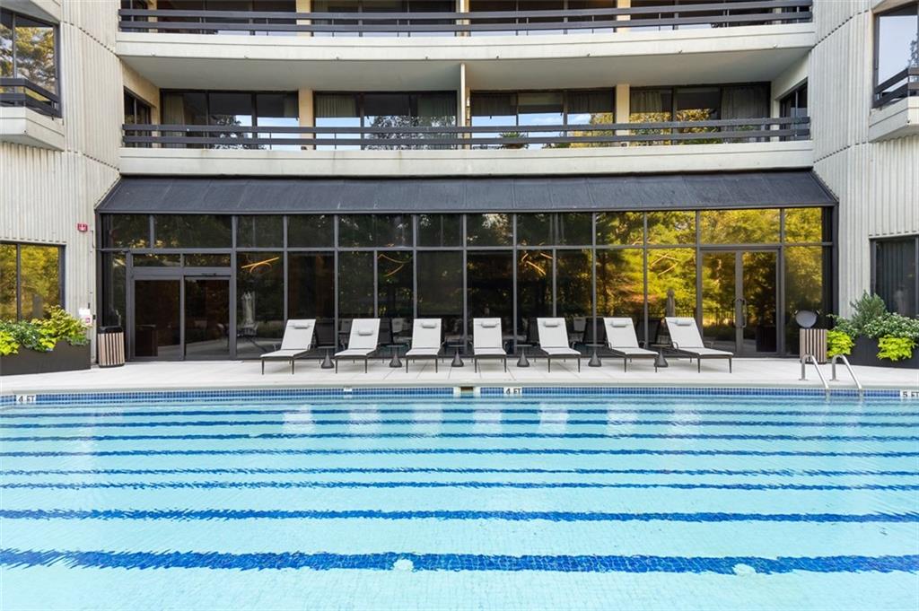 2660 Peachtree Road Northwest, Unit 19A Atlanta, GA 30305 - Photo 41 of 51 a view of a building with a floor to ceiling window and a floor to ceiling window