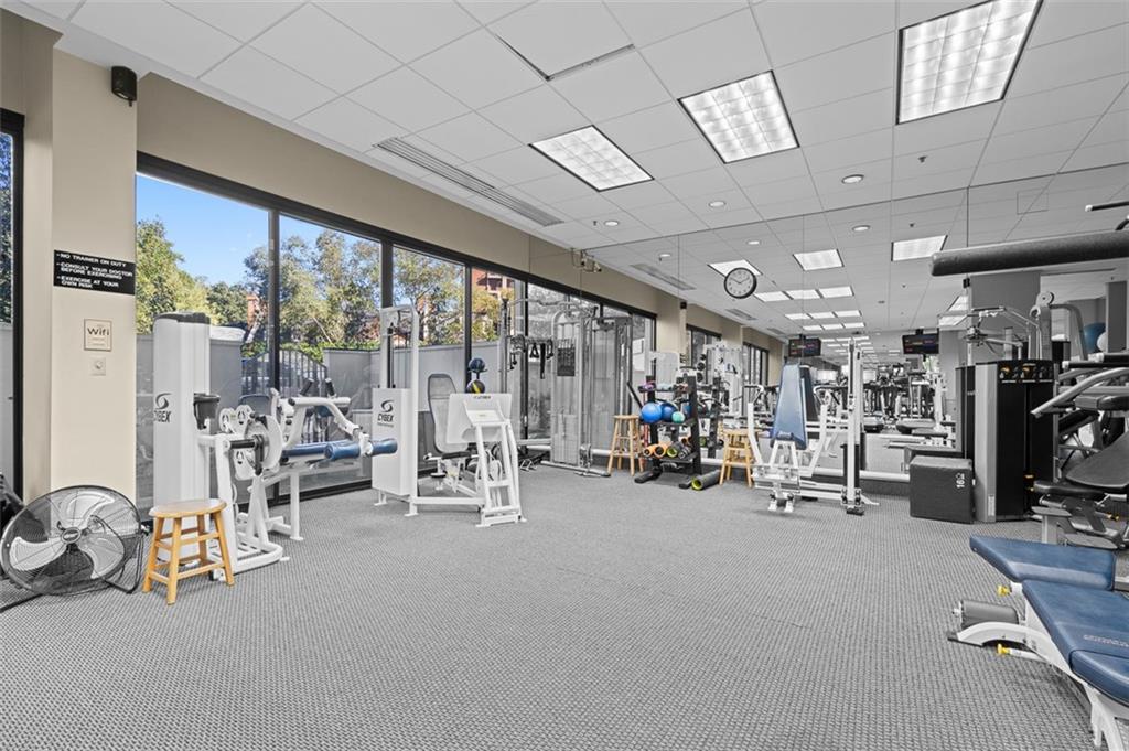 2660 Peachtree Road Northwest, Unit 19A Atlanta, GA 30305 - Photo 46 of 51 a view of a room with gym equipment