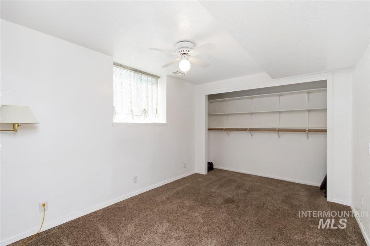 10178 West Fox Ridge Drive Boise, ID 83709 - Photo 21 of 36 Room featuring carpet flooring and white walls
